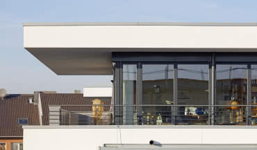 Okna z PVC-U a architektura budynku 